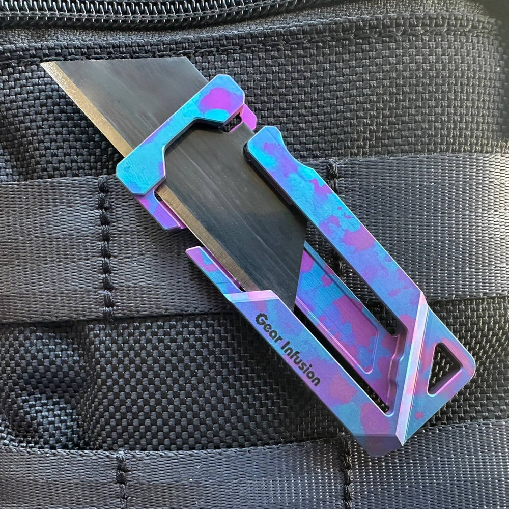 Triple anodized titanium multi-tool with unique purple and blue camo design, featuring a handcrafted layered finish, precision anodizing, and collector’s edition quality.