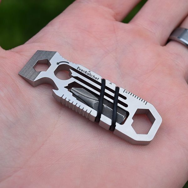 EverRatchet multi-tool with dynamic ratcheting beam, reversible functionality, and Flint2Go fire flint, designed for everyday carry (EDC) and outdoor use.