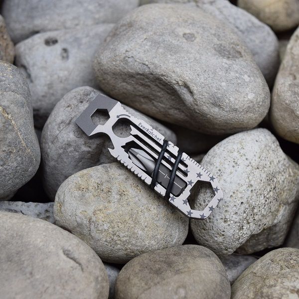 EverRatchet multi-tool with dynamic ratcheting beam, reversible functionality, and Flint2Go fire flint, designed for everyday carry (EDC) and outdoor use.