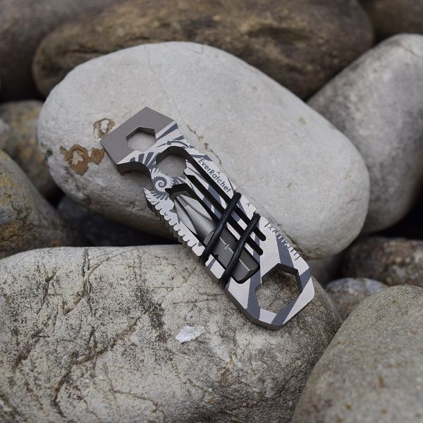 EverRatchet multi-tool with dynamic ratcheting beam, reversible functionality, and Flint2Go fire flint, designed for everyday carry (EDC) and outdoor use.